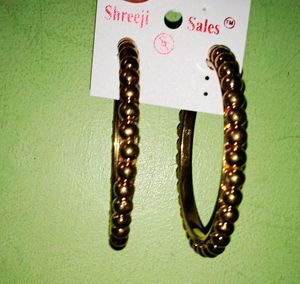 Round Earring Of Golden Color