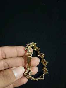 Elegant Gold Finish Bracelet with Multicolour Ston