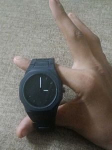 a watch full black and very light weight