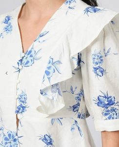 White Peplum Top
