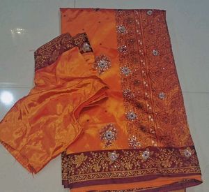 Orange  and maroon Embroidered Saree