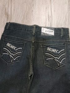C. Com Jeans Bootcut