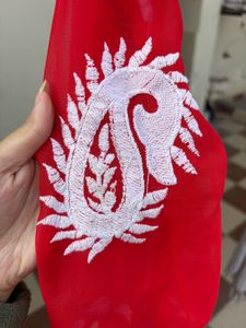 A beautiful red chikankari short kurti