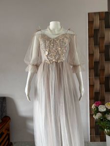 Faint pink tulle gown