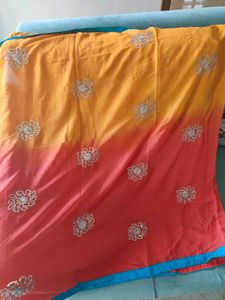 Lehengas with contrast choli and dual tone dupatta