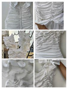 White Ruffled Mermaid Gown