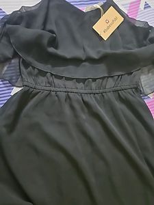 Black dress with sling bag