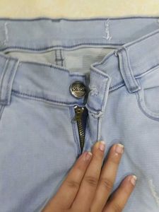 A Ripped Blue Jeans