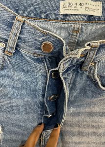 Ripped Straight Leg Jeans