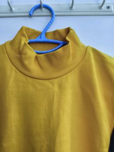 Yellow Sleeveless Turtleneck Top