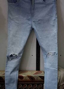 Ripped Knee Light Wash Jeans