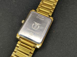Titan Watch For Men 1072 YAB Gold Colour