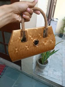 Elegant Gold Handbag