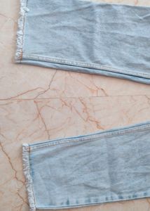 Ankle Length Torn Jeans From Zudio