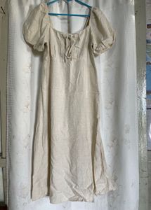 puff-sleeve cream midi dress