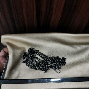 NWT Embelle Gold Cluth With Black Metal Sling