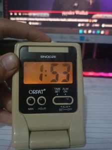 Portable Desk Clock Foldable With Alarm Facility.