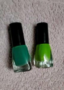 Parrot Green And Peacock Blue Nailpolishes.