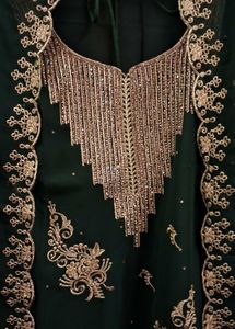 Pakistani mehandi stone work suit