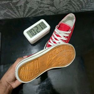 Red Low-Top Canvas Sneakers.