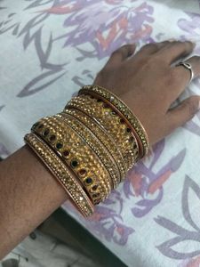 9 Sets Of Bangles