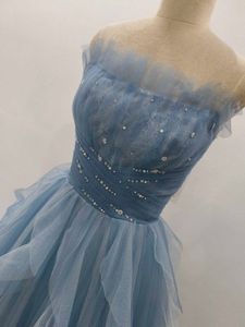 Elegant Blue Ruffled Gown