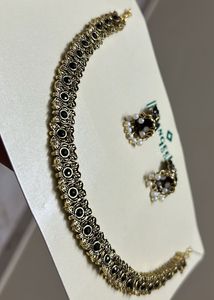 Black With Gold Neck Piece And Matching Jhumka