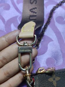 Brand New Louis Vuitton Multi Pouchette Sling Bag.