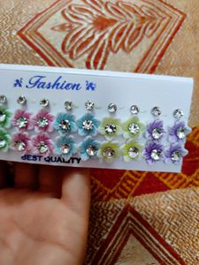 9 PAIR STUDS