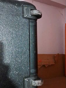 Black Suitcase For Tourism In Coin