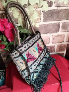 Embroidered Handbag with Moti Tassels