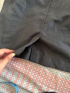 Tailored black straight skirt with back slit