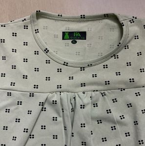 Light greenish blue top (Never worn before)