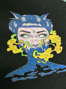 Unique black graphic tee with eye-catching detail