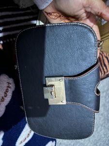 Black Hand Bag And Sling