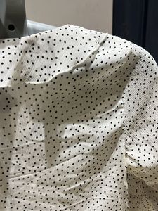 Polka Dot Peplum Top