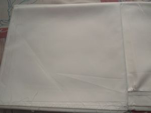 Plain White Unstitched Cloth Of Shirt