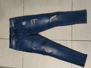 Ripped Blue Denim Jeans