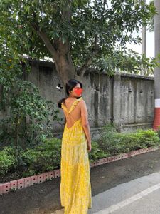 backless yellow flowy sundress