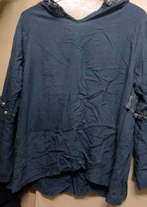 A Dark Grey Top With Beads