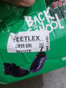 black and white school shoes