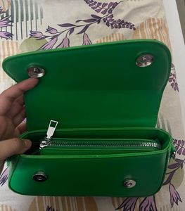 Stunning Green Sling Bag With Embellished Chain