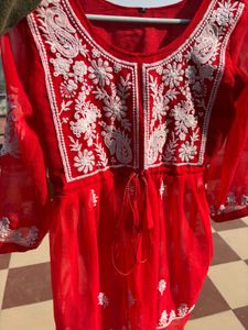 A beautiful red chikankari short kurti