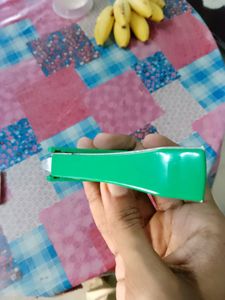 Stapler with pin remover