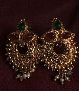 Rich Gold Jewellery Set Of One Detailed Worked Pendent With Two Royal Earings Completes Your Saree Look Perfectly