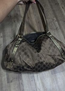 Gucci Gold Metallic Monogram Abbey Dring Toet