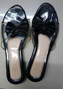 Black Sandal With Bow And Transparent Layer On It