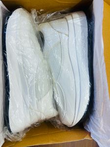 White sneakers branded new