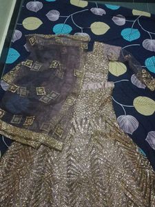 lehenga with small pipes like beads.