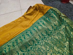 Elegant Mustard Saree with Gold Border